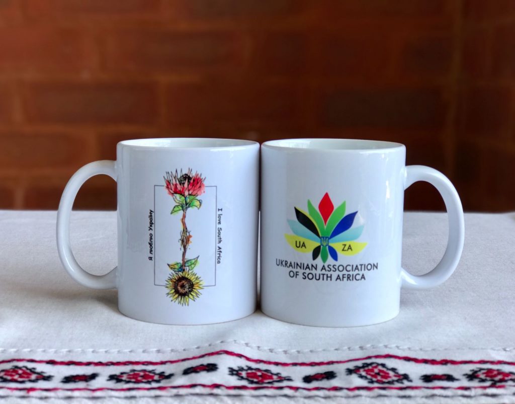 Mug with flowers (sunflower and protea)